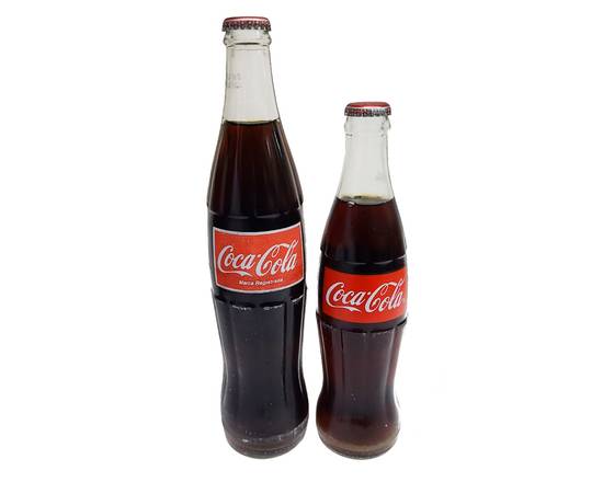 Order Coca Cola Glass Bottle (16.9 fl oz) food online from Gonzalo Taqueria Y Carnitas store, Lake Worth on bringmethat.com