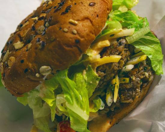 Order '' Liberation ''Double Cheese Burger food online from The Vegan Snack Shack store, New Orleans on bringmethat.com