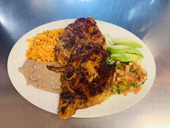 Order #17. Grilled Or La Diabla Pork Chops (2 pcs) (Chuletas a La Plancha o a La Diabla) food online from Taqueria Puro Jalisco store, Pasadena on bringmethat.com