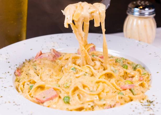 Order Fettuccini Carbonara food online from Emilios Pizzeria & Restaurante store, Saint Cloud on bringmethat.com