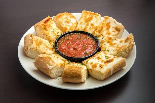 Order Sicilian Garlic Cheese Bread food online from Old Spaghetti Factory store, Hillsboro on bringmethat.com
