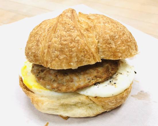 Order Croissant Sandwich: Sausage & Egg food online from Donut Tacos Palace store, Austin on bringmethat.com