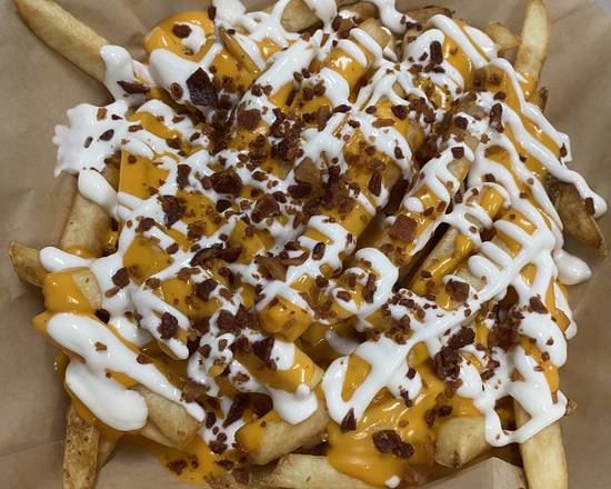 Order Basket of Cheddar Frites food online from The Nest Bar & Eatery store, Chicago on bringmethat.com