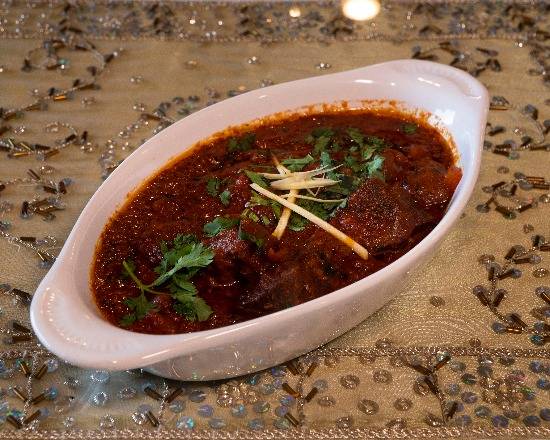 Order Lamb Rogan Josh food online from India Palace store, Bonita Springs on bringmethat.com