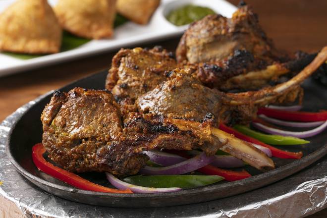 Order Adraki Lamb Chops food online from Natraj's Indian Bistro store, Rancho Santa Margarita on bringmethat.com