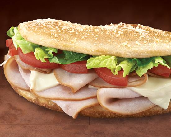Order Large Turkey Club Sub food online from Hungry Howie's Pizza store, Brandon on bringmethat.com