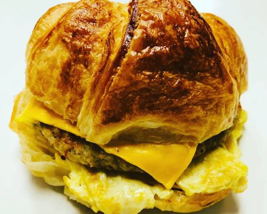 Order Croissant Sandwich: Sausage, Egg, & Cheese food online from Donut Tacos Palace store, Austin on bringmethat.com