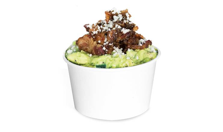 Order Guac & Chips with Sugared Bacon & Cotija Cheese food online from Avo Taco store, New Orleans on bringmethat.com