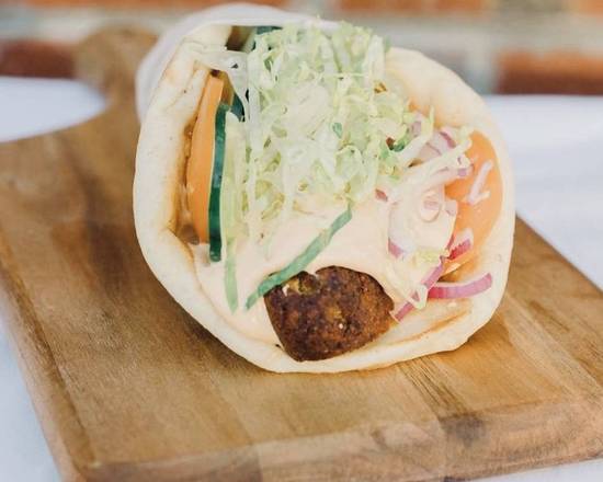 Order Falafel Wrap or Pita food online from Greens & Grains Shrewsbury store, Shrewsbury on bringmethat.com
