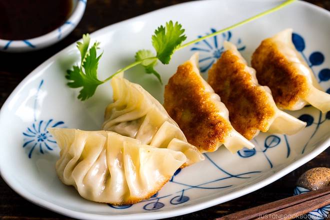 Order A07.Gyoza (10 pcs) food online from Fuji Revolving Sushi Bar store, Cypress on bringmethat.com
