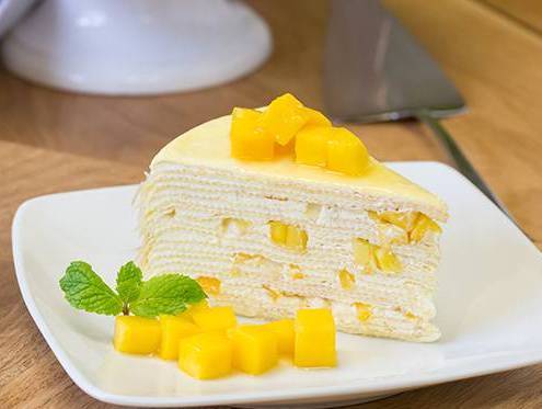 Order Mango Crepe Cake (芒果千层糕) food online from Kyuramen 九汤屋 store, Cherry Hill on bringmethat.com
