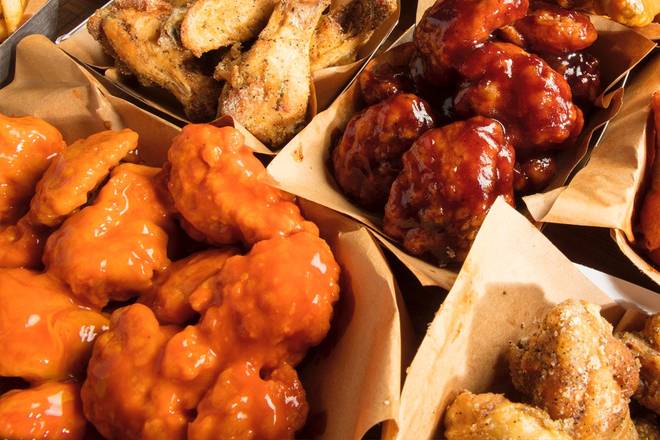 Order 30 PC BONELESS WINGS food online from Charleys Cheesesteaks And Wings store, Orlando on bringmethat.com