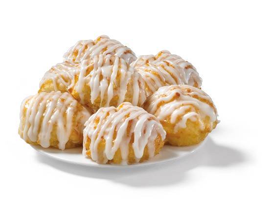 Order 8 Frosted Honey-Butter Biscuits food online from Church's Chicken store, Laredo on bringmethat.com