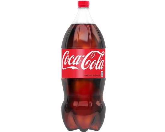 Order Coke 2-Liter food online from NYPD Pizza store, Orlando on bringmethat.com