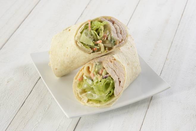 Order Turkey, Swiss, and Slaw Wrap food online from Nature's Table store, Orlando on bringmethat.com