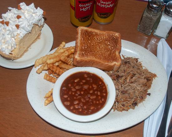 Order Carolina Pulled Pork food online from Woody Bar-B-Q store, Cocoa on bringmethat.com