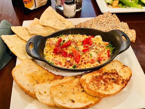 Order Oven-Baked Artichoke Dip (V) food online from The Goose Acre store, The Woodlands on bringmethat.com