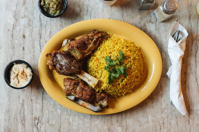 Order Lamb on Bed of Long Grain Basmati Kebsa (Zurbyan) Rice food online from Hadramout Restaurant store, New York on bringmethat.com