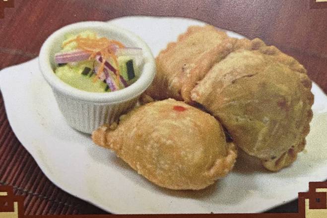 Order Curry puff (chicken,mixed vegetables) food online from The Blue Elephant Restaurant store, Saint Louis on bringmethat.com