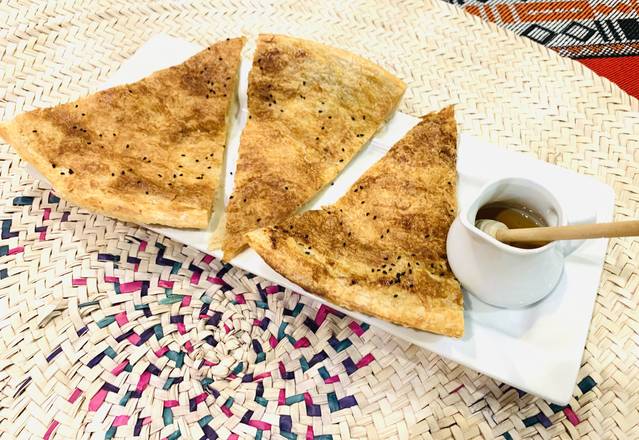 Order Sabaya one Slice (  قطعة سبایة) food online from House Of Mandi store, Anaheim on bringmethat.com