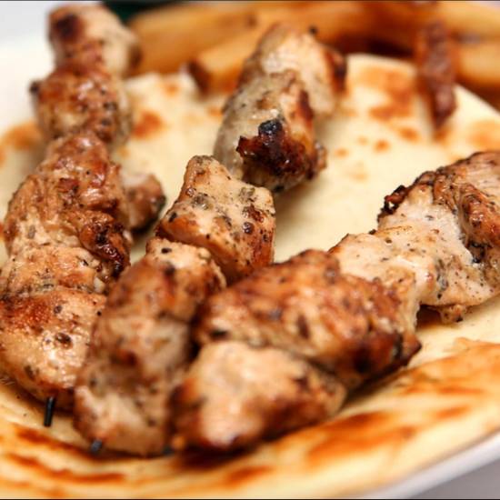 Order Souvláki Plate food online from Zorba Café store, Washington on bringmethat.com