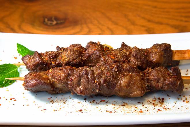 Order Roasted Angus Beef Skewers (2 Pieces) food online from JA Jiaozi Authentic Dumplings store, Irvine on bringmethat.com