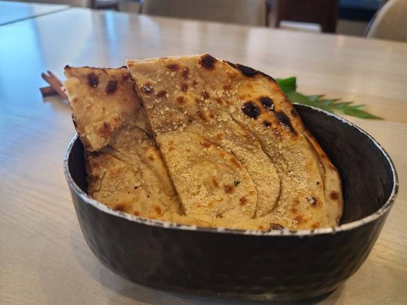 Order Parmesan Chur Chur Naan food online from Raag Indian Cuisine store, Minneapolis on bringmethat.com