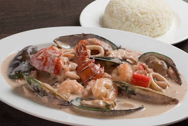 Order Corvina en Salsa Marinera food online from El Guayaquileno Restaurant store, Elmhurst on bringmethat.com