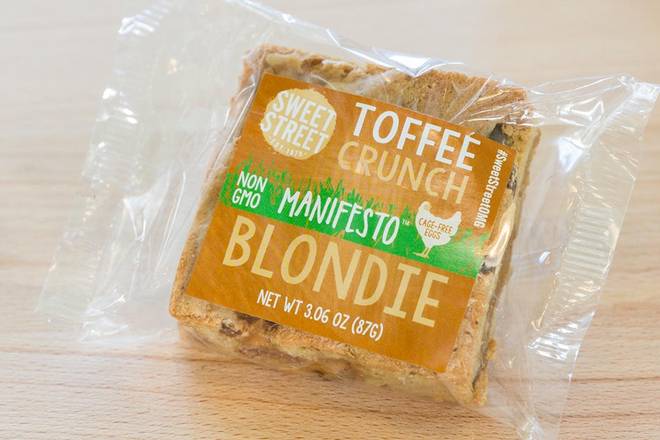 Order TOFFEE CRUNCH BLONDIE - VEG food online from Mad Greens store, Lakewood on bringmethat.com