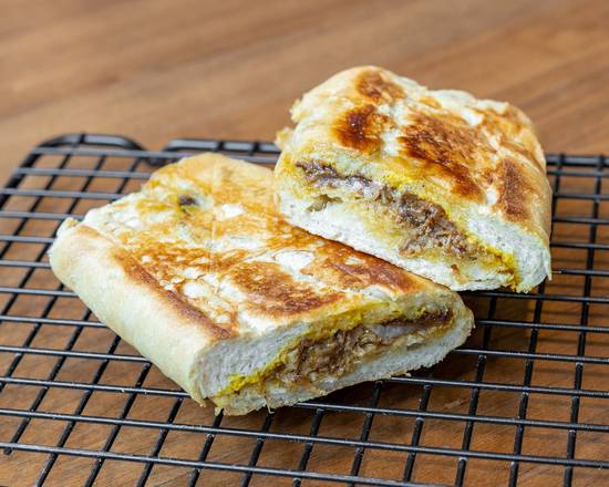 Order Lechon Sandwich food online from El Tropico Cuban Kitchen store, Aventura on bringmethat.com