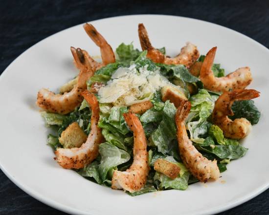 Order Big Islander Caesar Salad with Shrimp food online from Rainforest Cafe - Galveston store, Galveston on bringmethat.com