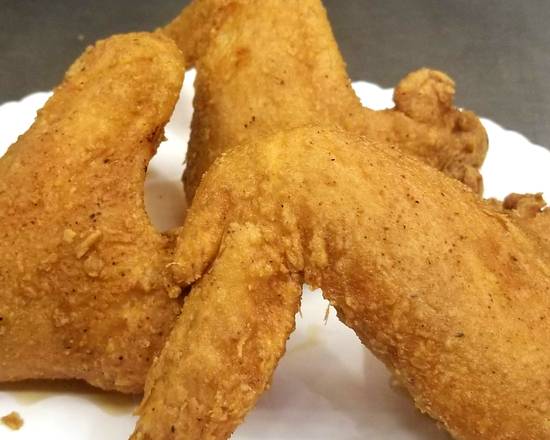 Order Twelve Whole Chicken Wings food online from Mojoe’s store, Rochester on bringmethat.com