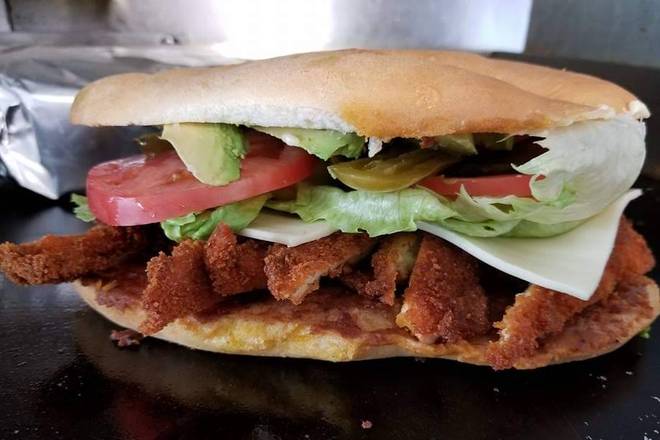 Order Torta de Milanesa food online from El Camaleon Food Truck store, Wheaton on bringmethat.com