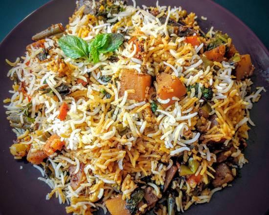 Order Veg Dum Biryani food online from Desi Chops store, Chicago on bringmethat.com