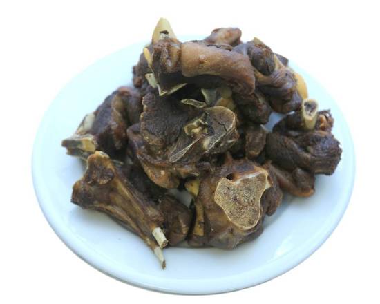 Order Goatmeat food online from Wazobia Kitchen store, Houston on bringmethat.com