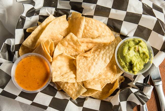 Order Chips and Guacamole food online from Catrina's Cerveza and Grill store, St Anthony on bringmethat.com