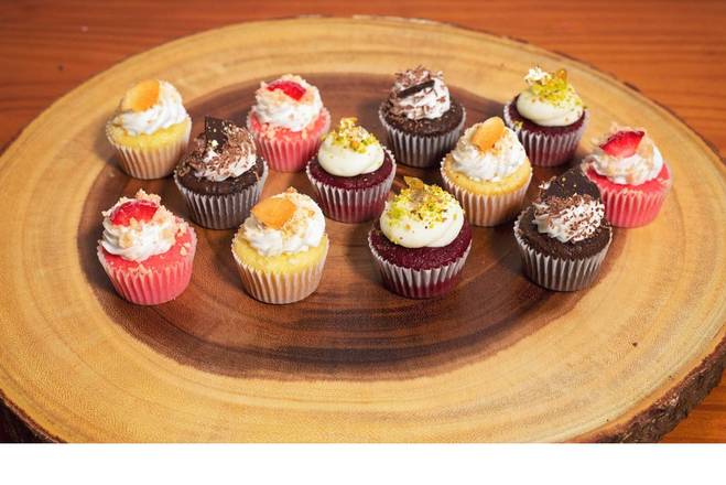 Order Mini Cupcakes (1 dz) food online from 2morrows Cakes store, Plant City on bringmethat.com