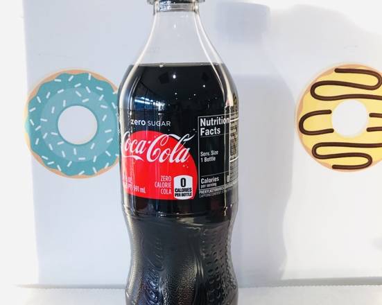 Order Bottle Soda: Coca-Cola Zero Sugar  food online from Donut Tacos Palace store, Austin on bringmethat.com