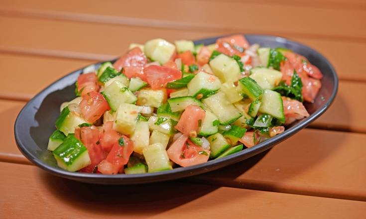 Order Side of Israeli Salad food online from Holy Schnitzel store, Aventura on bringmethat.com