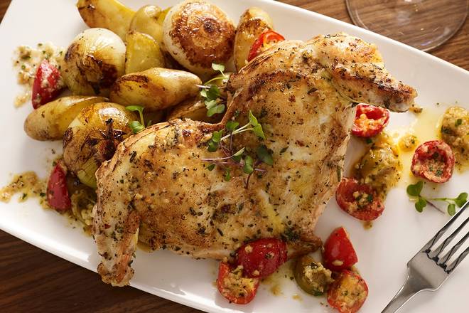Order HERB BRICK CHICKEN food online from Sullivan's store, Palm Desert on bringmethat.com