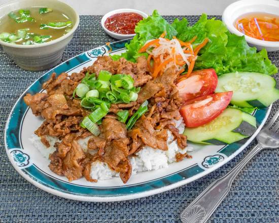 Order 52. Com Thit Nuong food online from Pho Ty Ii store, Hayward on bringmethat.com