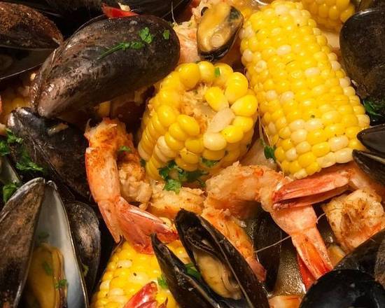Order Black Mussel food online from Dancing Crab Cajun Seafood Express store, Memphis on bringmethat.com