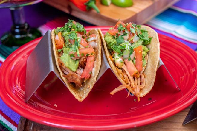 Order Carnitas Tacos (2 pcs) food online from Cafe Coyote store, San Diego on bringmethat.com