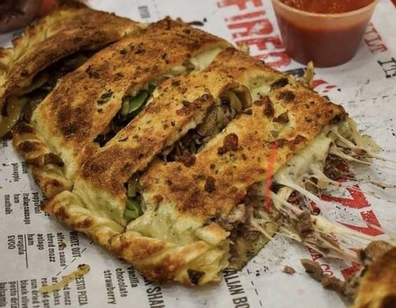 Order Philly Cheesesteak Stromboli food online from Fired Up Pizza West store, Loxahatchee on bringmethat.com