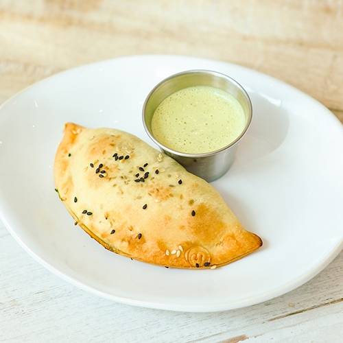 Order SPINACH AND CHEESE EMPANADA food online from Pura Vida store, Miami on bringmethat.com