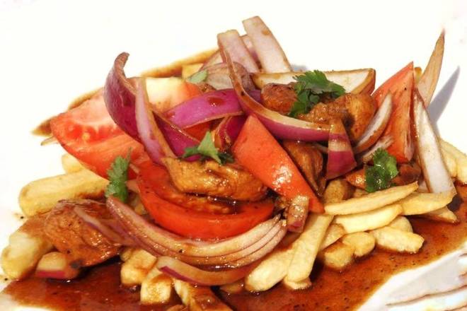 Order Pollo Saltado food online from Machupicchu Peruvian Cuisine Restaurant store, Miami on bringmethat.com