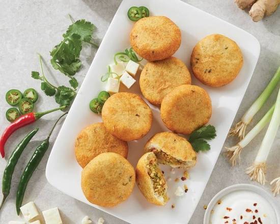 Order Aalu Tikki (potato pattie) food online from Hadi Restaurant store, New York on bringmethat.com