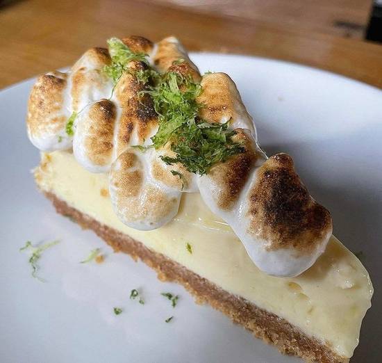 Order Key Lime Pie food online from Coastal Kitchen & Daiquiri Bar store, Bay Shore on bringmethat.com