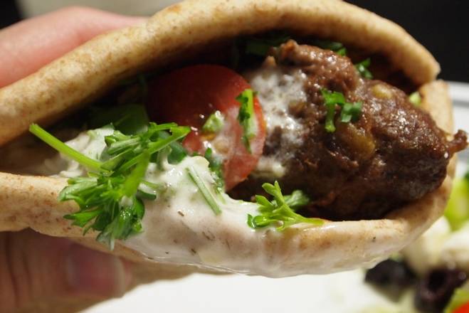 Order Greek souvlaki beef in pita food online from Eat Greek store, Daytona Beach on bringmethat.com