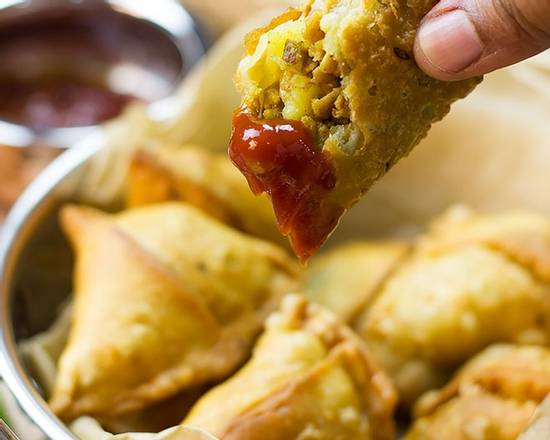 Order Triangles of Love (Chicken) food online from Desi Chops store, Chicago on bringmethat.com